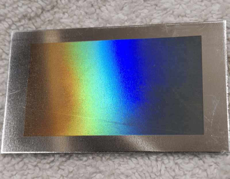 laser engraved metal with Iridescent and Diffraction Effects