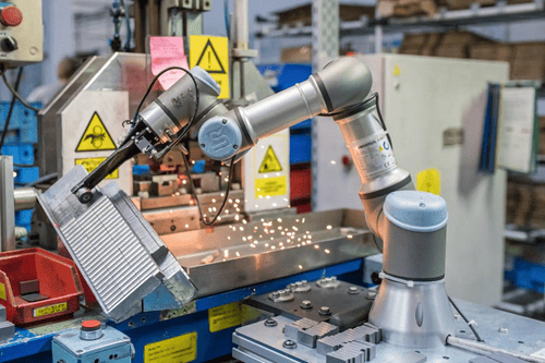 robotic arm picking an industrial part