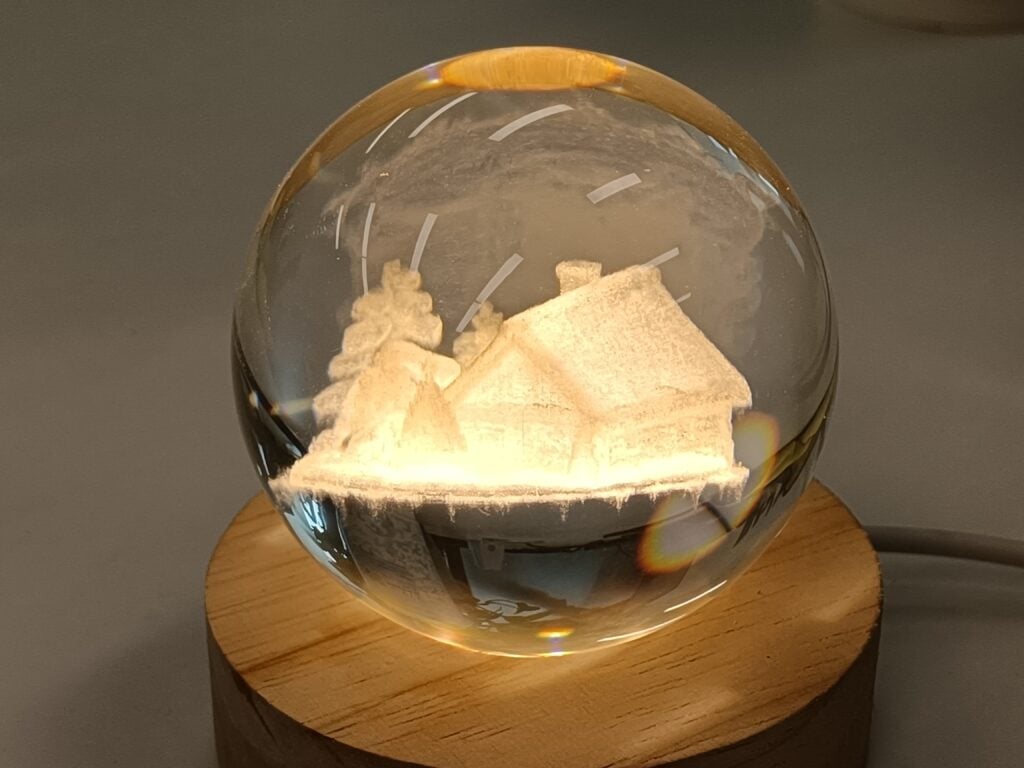 K9 sphere laser engraved by ComMarker Omni X uv laser engraver