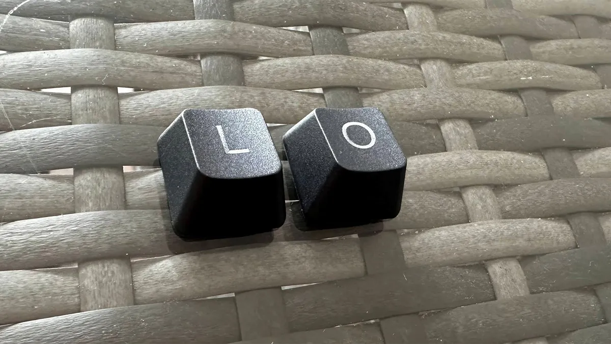 ComMarker Omni X UV laser engraver marking black keycap in Tom’s Hardware review