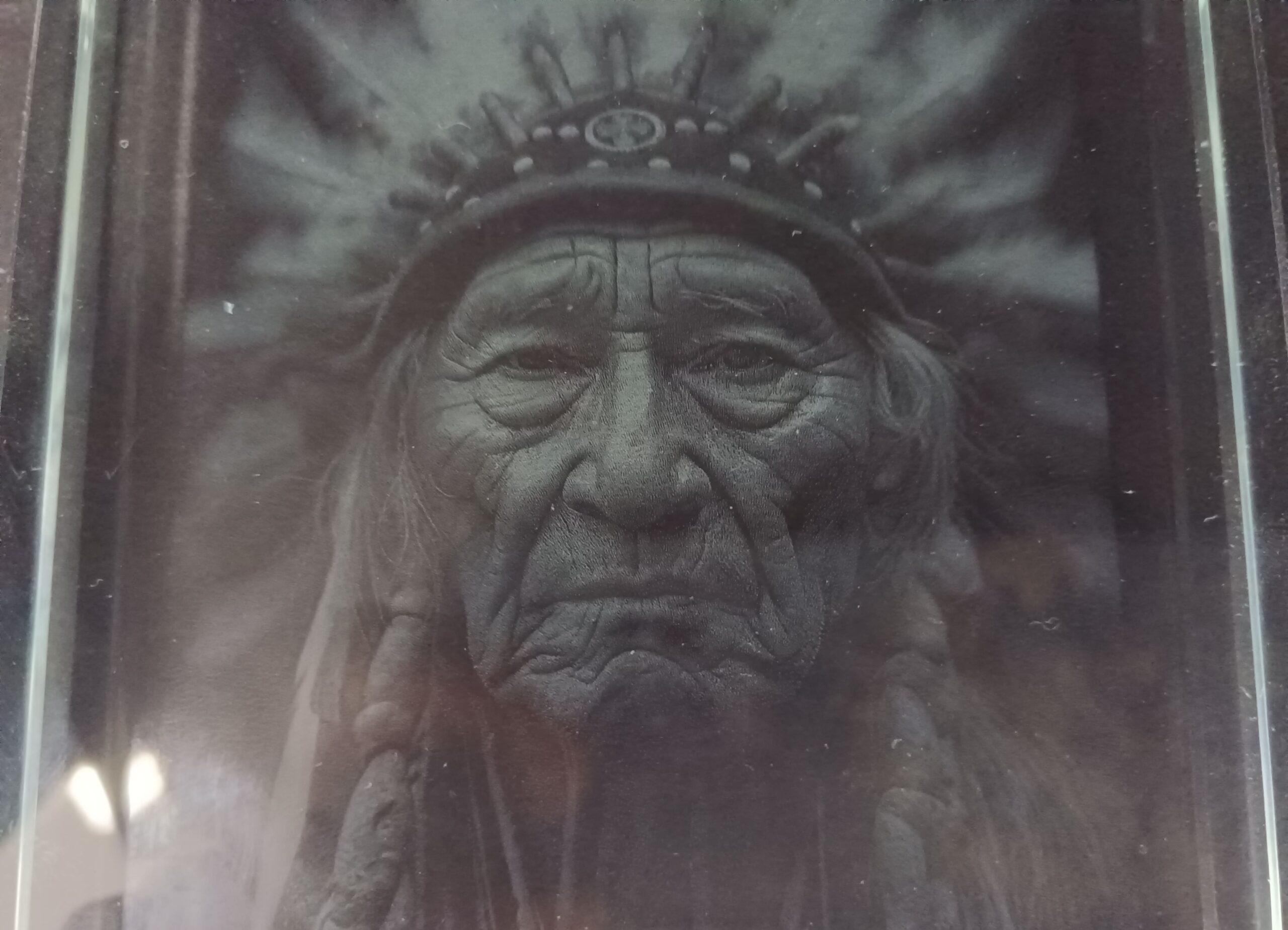 Photo engraved inside glass with UV laser