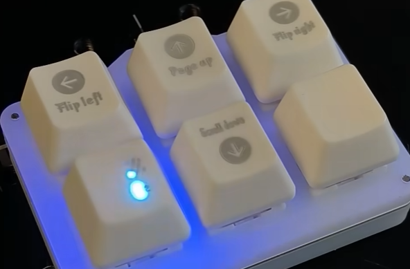 Laser engraving a keyboard keycap, marking patterns in progress