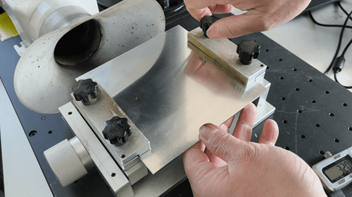 placing metal sheet for laser cutting