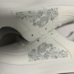 Pair of sneakers laser engraved with a UV laser engraver