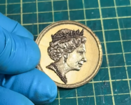 Laser engrave coin after polishing