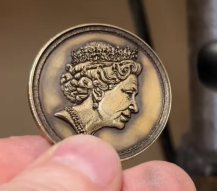 blacked brass coin