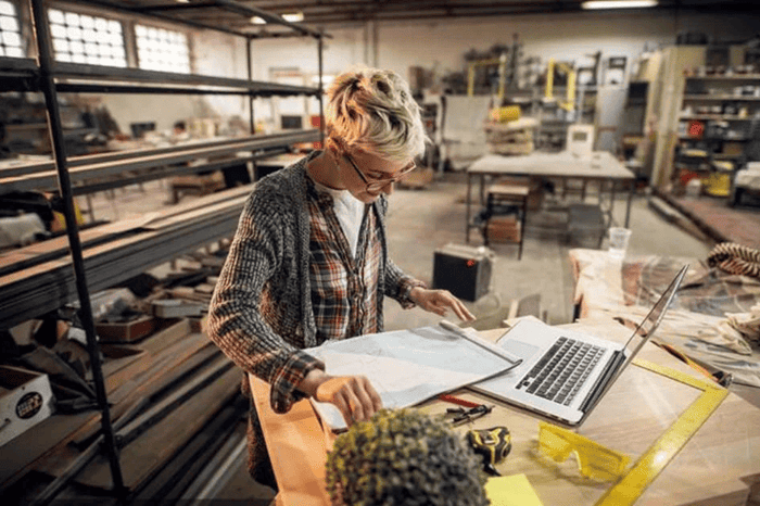 a woman in the studio designing artwork