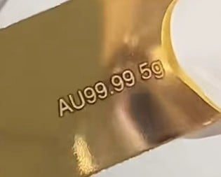 laser engraved bright mark on gold