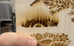 Wood engraving overburned with 55W glass tube CO2 settings on galvo